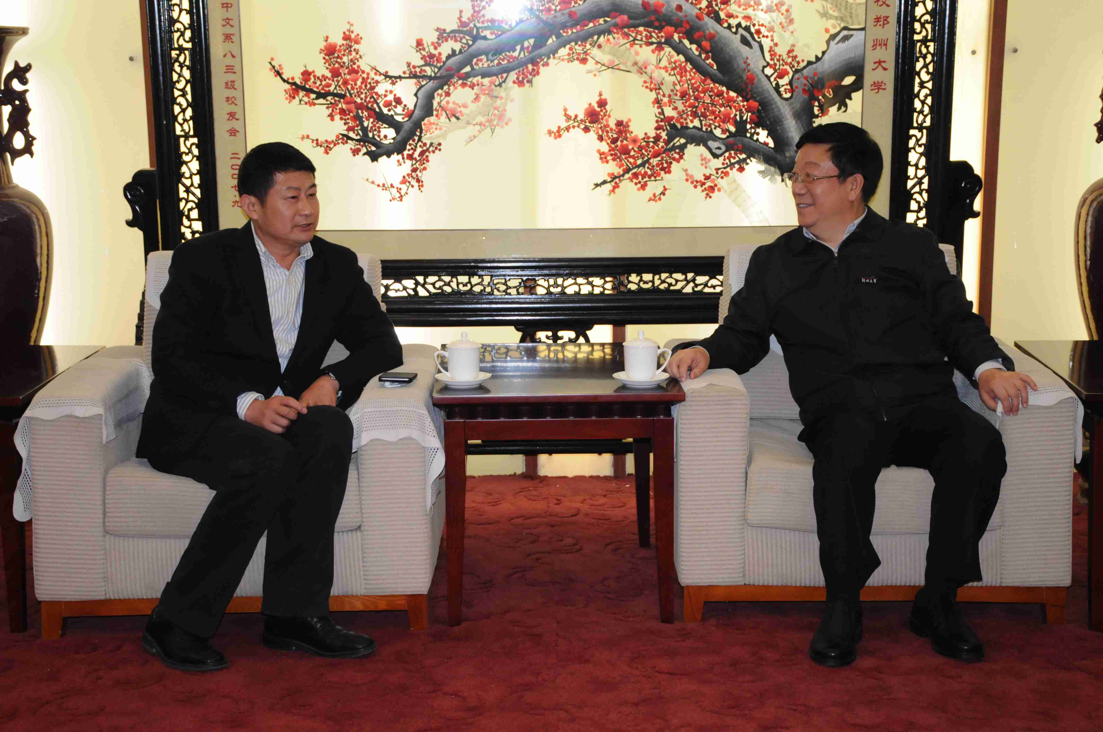 西平县党政领导来我校访问