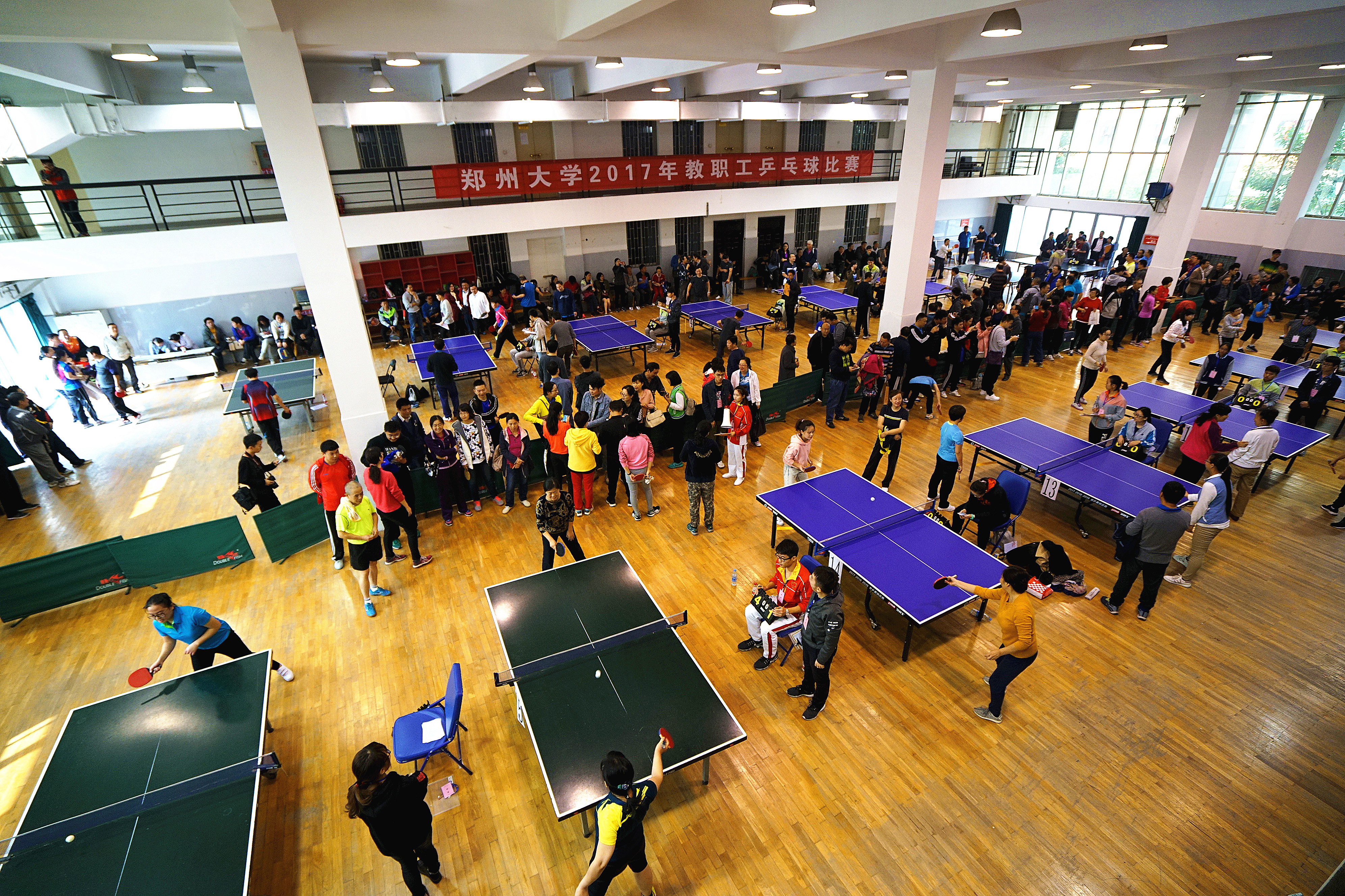 郑州大学举办2017年教职工乒乓球比赛（图）