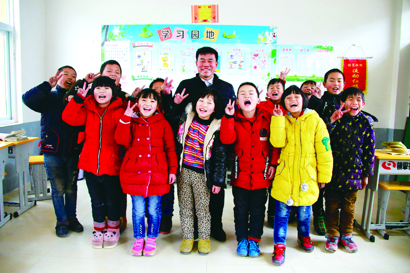 学习时代楷模 做“四有”好老师——聆听张玉滚同志先进事迹报告有感（图）