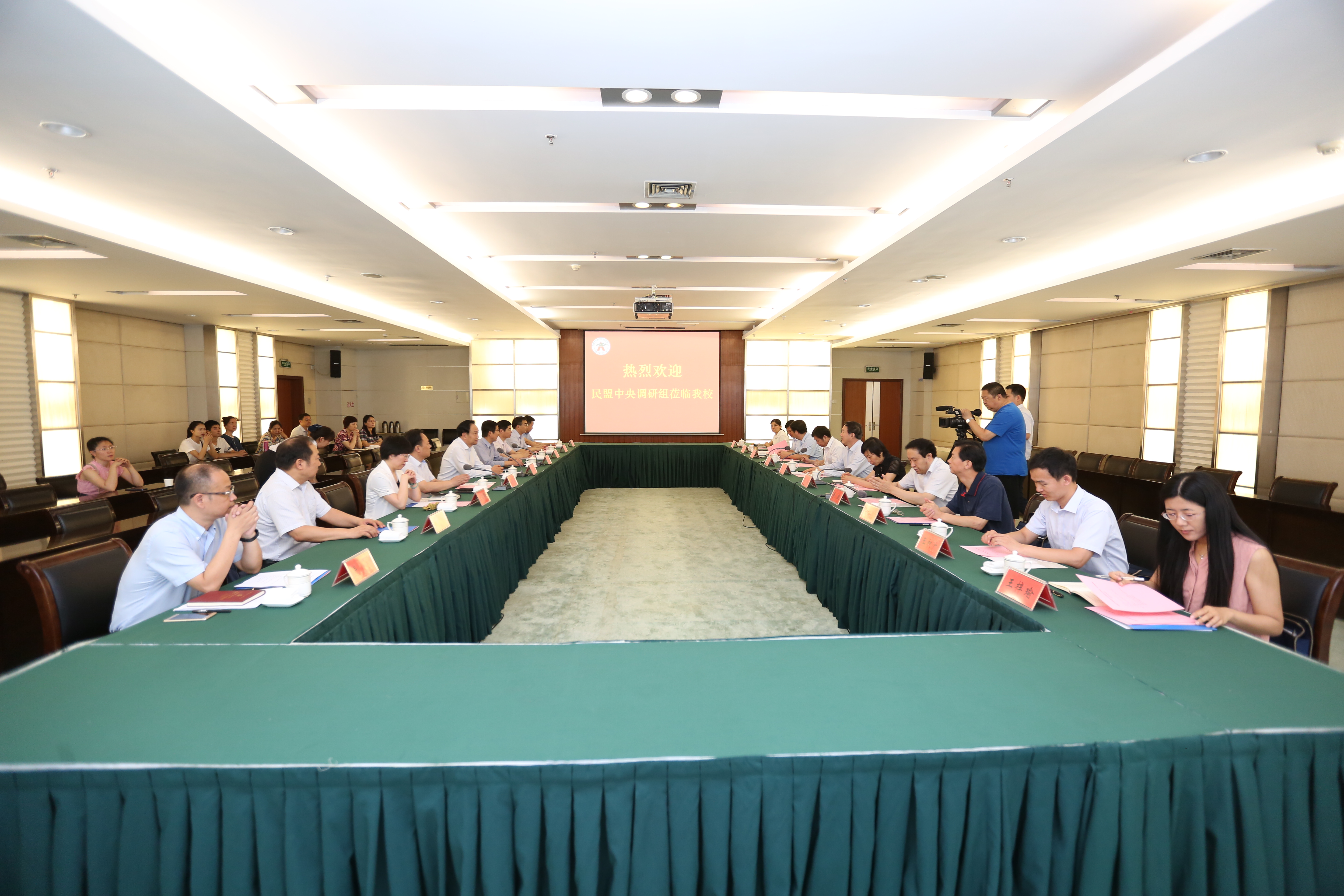 民盟中央调研组来我校调研（图）